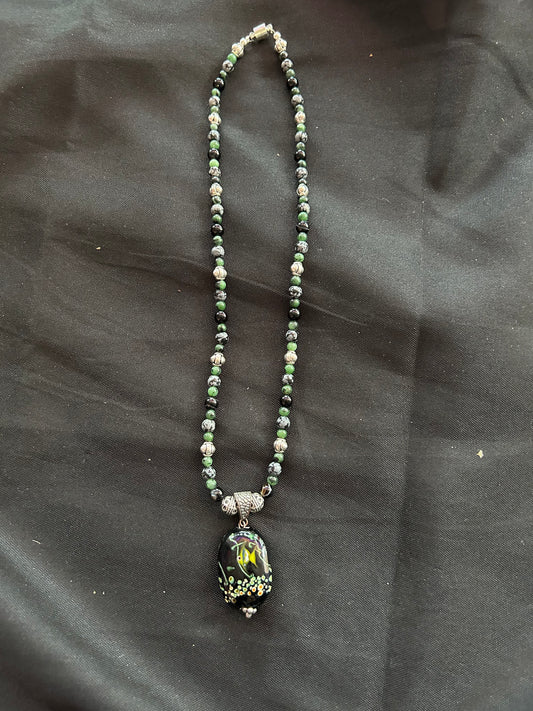 Green and Black Necklace with Fish Pendant